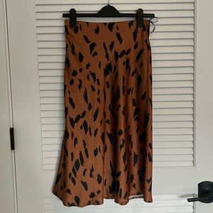Burnt orange leopard print satin skirt